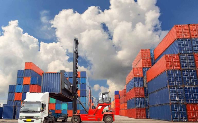Loading a container onto a truck.