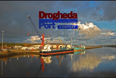 Drogheda Port Company logo over an image of a container ship at a port