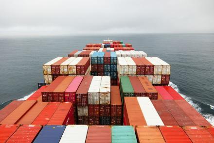 View from a cargo ship containers in the ocean by Rinson Chory