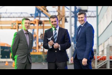 Port of Cork and ESB representitive standing on a dock 